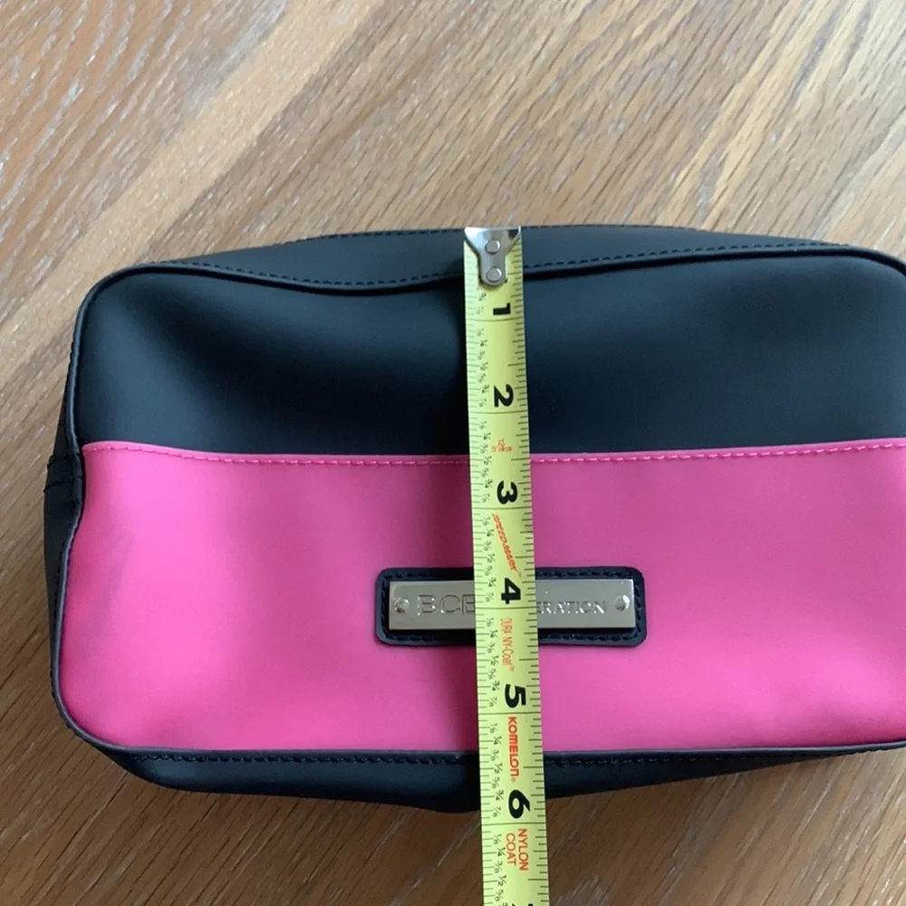 BCBGeneration plastic zippered cosmetic case pink black